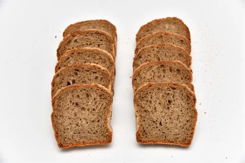 Slices of rye bread on white background 000012602 05 Stock Photos