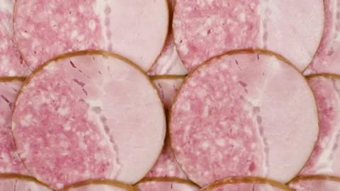Slices of salami  background. Video stock 151511595