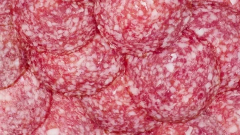 Slices of salami  background. Video stock 151511610