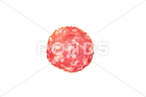Slices of salami sausage on a white background Stock Photos