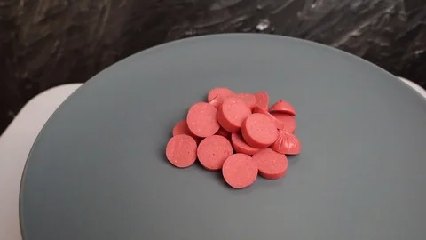 Slices of sausages on grey plate Stock Footage 107734026