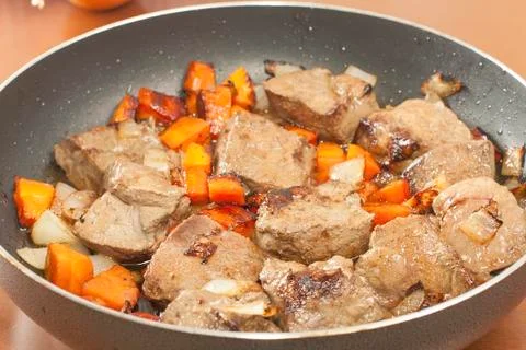 Slices of sauteed beef liver Stock Photos