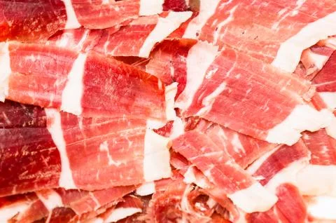 Slices of serrano ham Stock Photos