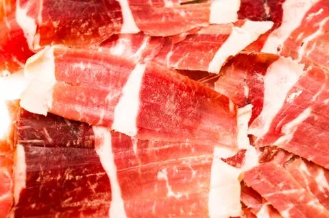 Slices of serrano ham Stock Photos
