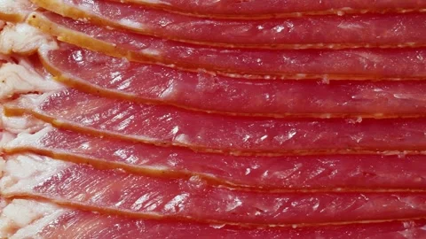 Slices of smoked bacon full frame close up Stock Footage 172142873