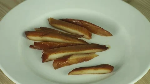 Slices of smoked eel sushi Stock Footage 174864441