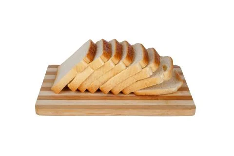 Slices of Toast Bread on Breadboard Stock Photos