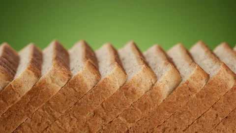 Slices of toast bread close up, green background Video stock 217378739