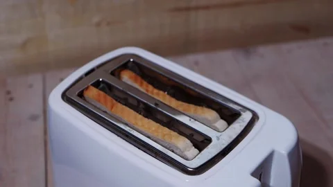 Slices of toast in a toaster Stock Footage 171239159