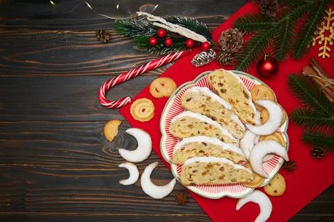 Slices of Traditional Christmas stollen cake with marzipan and New Year Stock Photos