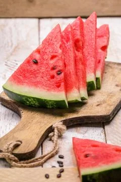 Slices of watermelon on table Stock Photos