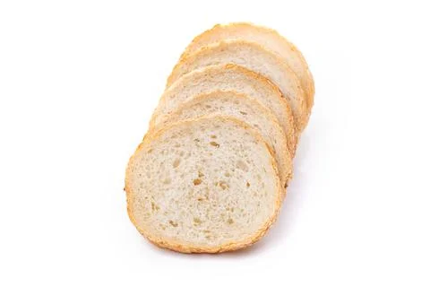 Slices of white bread or a loaf with sesame seeds isolated on a white backgro Stock Photos