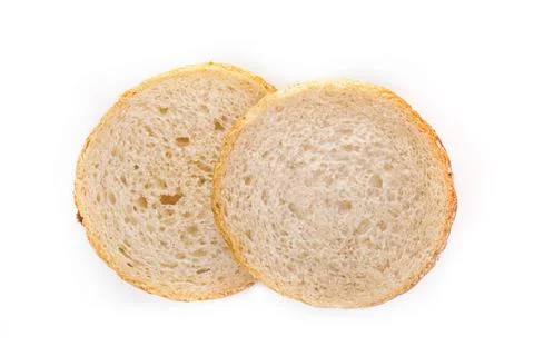 Slices of white bread or a loaf with sesame seeds isolated on a white backgro Stock Photos