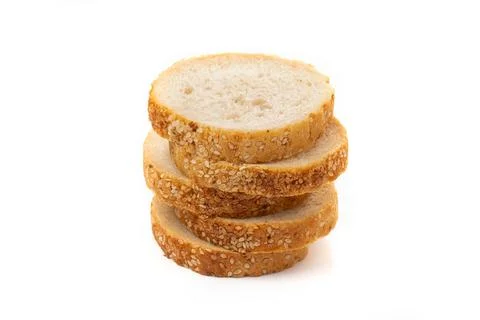 Slices of white bread or a loaf with sesame seeds isolated on a white backgro Stock Photos