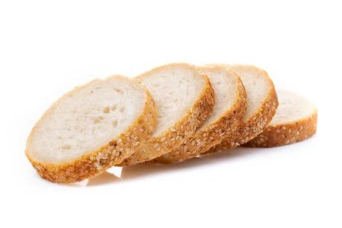 Slices of white bread or a loaf with sesame seeds isolated on a white backgro Stock Photos