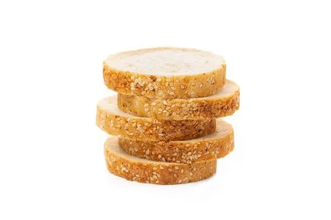 Slices of white bread or a loaf with sesame seeds isolated on a white backgro Stock Photos