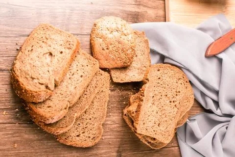 Slices of whitebread on table Stock Photos