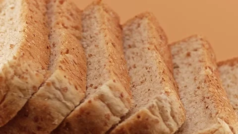 Slices of whole wheat bread. Panning shot. Stock Footage 310846317