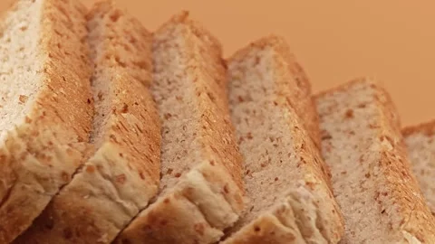 Slices of whole wheat bread. Zoom in. Stock Footage 310846307