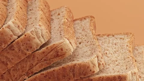 Slices of whole wheat bread. Zoom in. Stock Footage 310846320