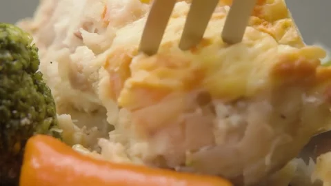 Slicing an Appetizing Cooked Cod Fillet with a Knife 库存影片 314045809