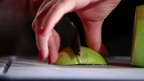 Slicing an apple for a cocktail. Stock Footage 80309216