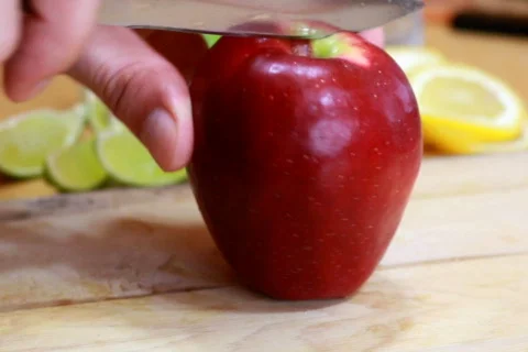 Slicing apple Stock Footage