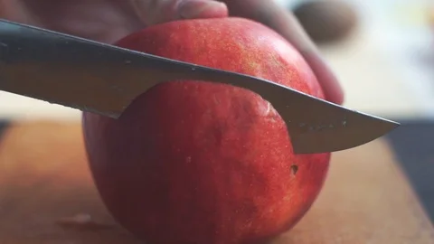 Slicing apple in slow motion Stock Footage 86682779
