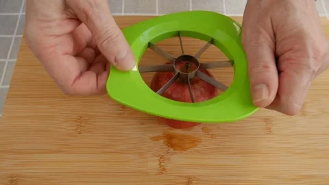 Slicing apple on the table. Stock Footage 245974729