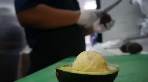 Slicing Avocado Stock Footage