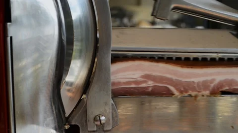 Slicing bacon Stock Footage 109394462