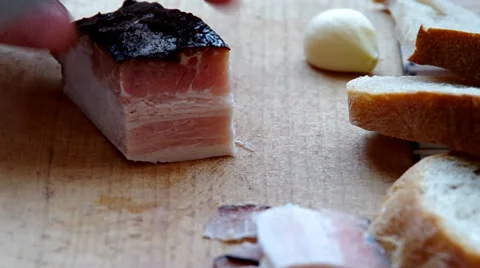 Slicing bacon with a knife Stock Footage 36782127