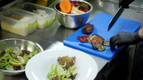 Slicing Baked Vegetables Stock Footage 131646608