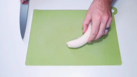 Slicing a Banana Stock Footage 113217712