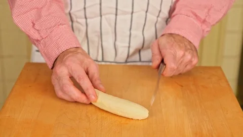 Slicing a Banana Stock Footage 126655243