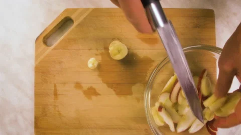 Slicing a banana Stock Footage 162130981