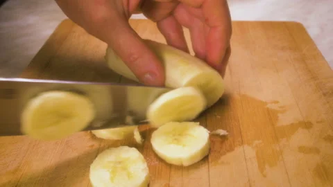 Slicing a banana Stock Footage 162133590