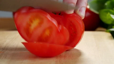 Slicing beef tomato, 4k, UHD Stock Footage 49259409