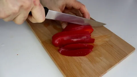 Slicing bell peppers Stock Footage 86251176