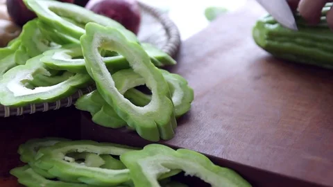 SLICING BITTER GOURD Stock Footage 76250440