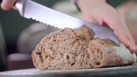 Slicing bread Stock Footage 89687866