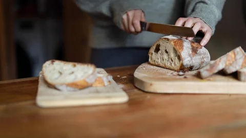 Slicing Bread In Slow Motion 스톡 동영상 128676528