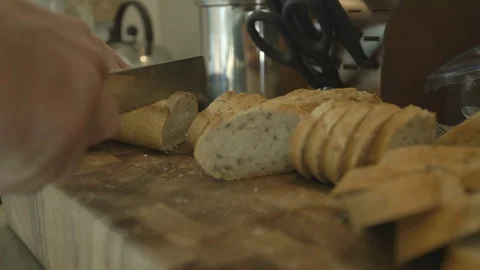Slicing Bread Stick For Bruschetta Stock Footage 121287622