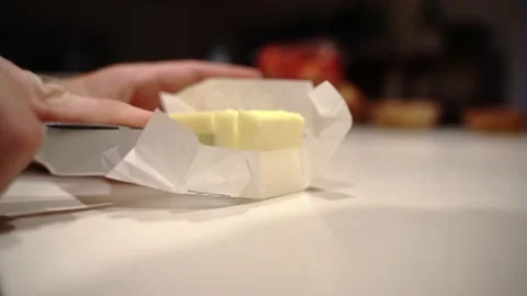 Slicing butter up close Stock Footage 222166762