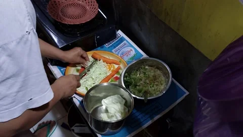 Slicing cabbage with a knife Stock Footage 231455685