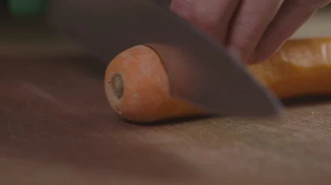Slicing a carrot into batons; close-up Stock Footage 64029788
