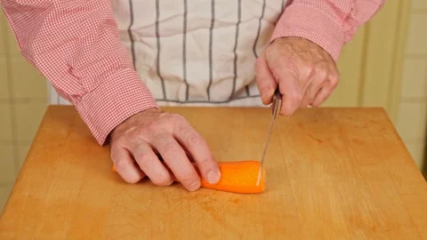 Slicing a Carrot Stock Footage 126655225