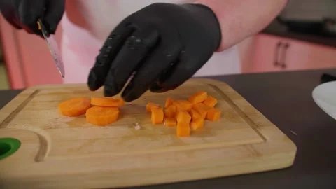 Slicing carrots Stock Footage 268577061