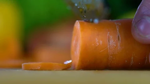 Slicing carrots with a knife Stock Footage 85227570