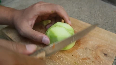 Slicing chayote Stock Footage 242171189